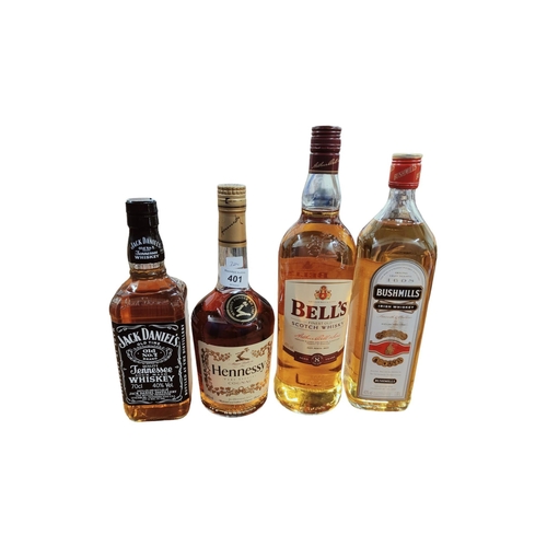 401 - BOTTLE OF BUSHMILLS WHISKEY, BELLS WHISKY, HENNESSEY COGNAC AND BOTTLE OF JACK DANIELS