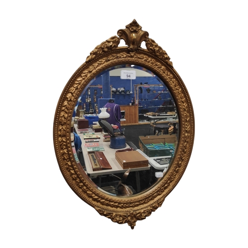 94 - OVAL GILT MIRROR