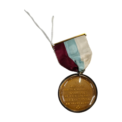 235 - SILVER RIMMED MASONIC JEWEL HONOURABLE TESTIMONIAL OF MASONIC CHARITY AND BENEVOLENCE INSTITUTED BY ... 