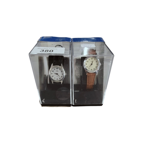 380 - 2 BOXED REFLEX WRIST WATCHES