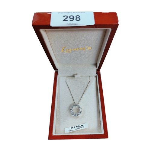 298 - 18 CARAT WHITE GOLD PENDANT SET WITH 12 BRILLIANT CUT DIAMONDS ON AN 18 CARAT WHITE GOLD CHAIN WITH ... 