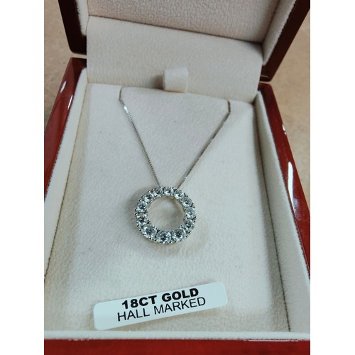 298 - 18 CARAT WHITE GOLD PENDANT SET WITH 12 BRILLIANT CUT DIAMONDS ON AN 18 CARAT WHITE GOLD CHAIN WITH ... 