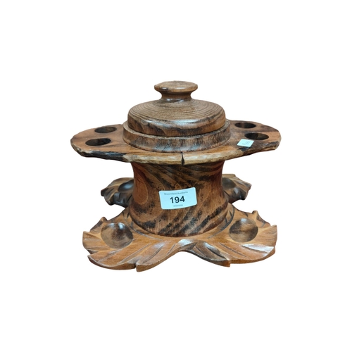 194 - COMBINED WOODEN TABACCO JAR AND PIPE STAND