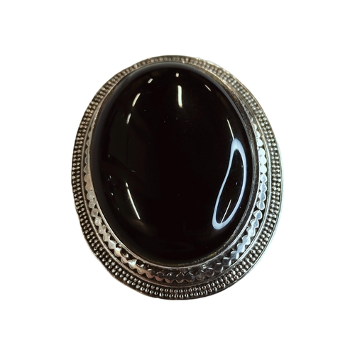 267 - SILVER OVAL ONYX BROOCH