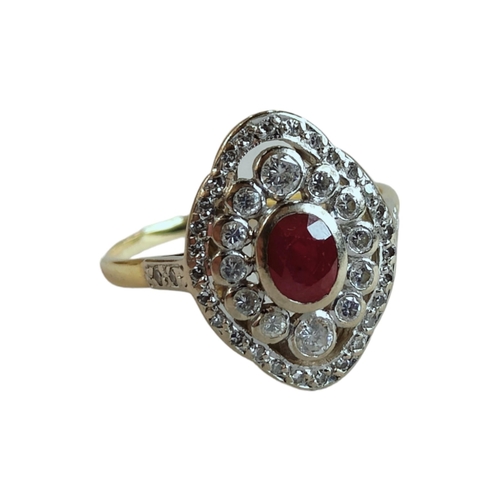 307 - 18 CARAT GOLD RUBY AND DIAMOND RING