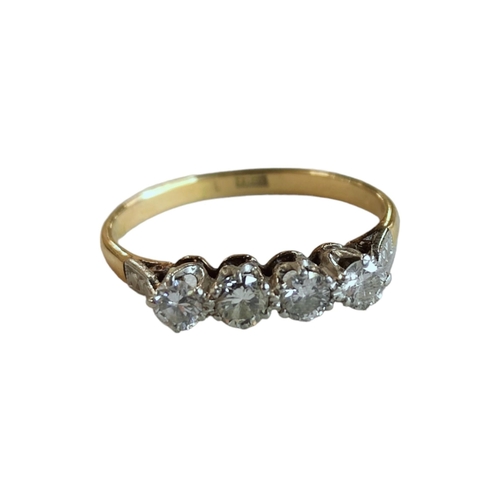 309 - 18 CARAT GOLD 4 STONE DIAMOND RING