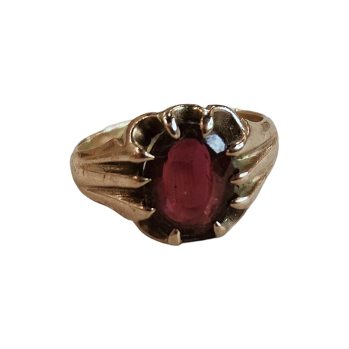 315 - 9 CARAT ROSE GOLD GARNET RING