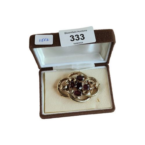 333 - ANTIQUE GOLD & AMETHYST BROOCH