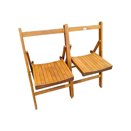 127 - 2 OLD WOODEN FOLDING DECK CHAIRS