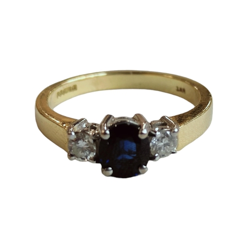 265 - 18 CARAT YELLOW GOLD SAPPHIRE AND DIAMOND RING WITH CIRCA 0.2 CARAT OF DIAMONDS