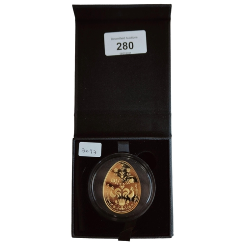 280 - CASED EGG SHAPED COIN - BASE METAL LAYERED IN 24 CARAT GOLD WITH CERTIFICATE