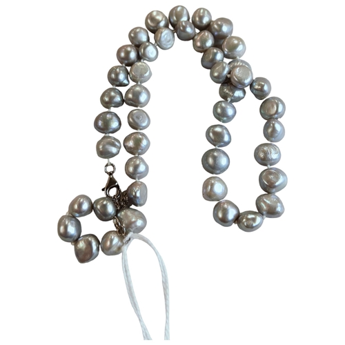 308 - STRING OF FRESH WATER PEARLS WITH SILVER CLASP