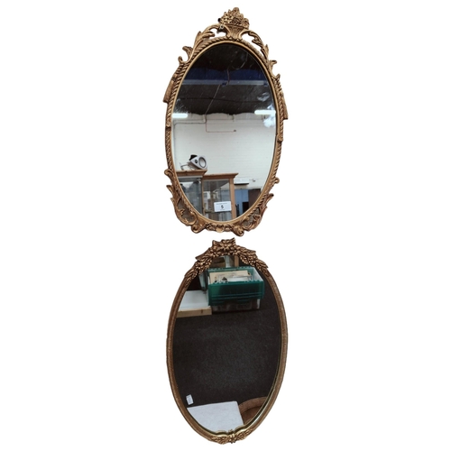 5 - 2 VINTAGE GILT FRAMED OVAL MIRRORS