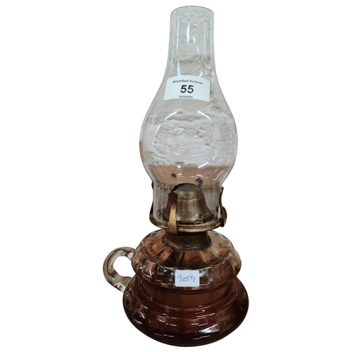 55 - ANTIQUE AMBER GLASS FINGER LAMP