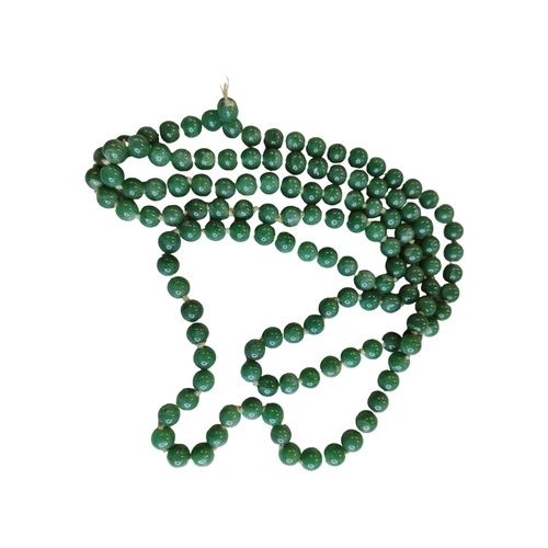 393 - LONG STRING OF JADE BEADS