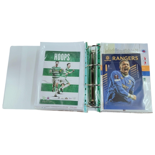 476 - FOLDER OF GLASGOW RANGERS PROGRAMMES 2021/22