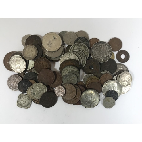 1098 - A COLLECTION OF WORLD COINS Coins from various countries including Australia, India, British West Af... 