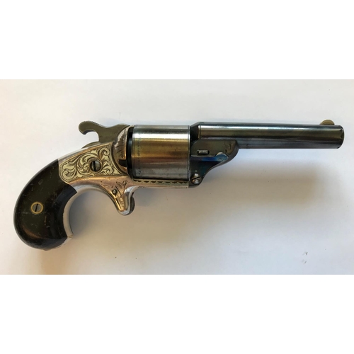 404 - A MOORES PATENT SIX SHOT REVOLVER. A Moores Patent revolver with an 8cm blued barrel numbered 16086,... 