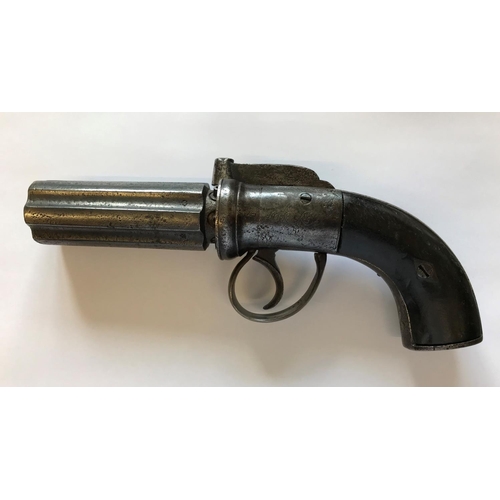 405 - A PEPPER BOX TYPE REVOLVER. An English Six Barel Pepper Box type revolver with a rotating 8cm barrel... 