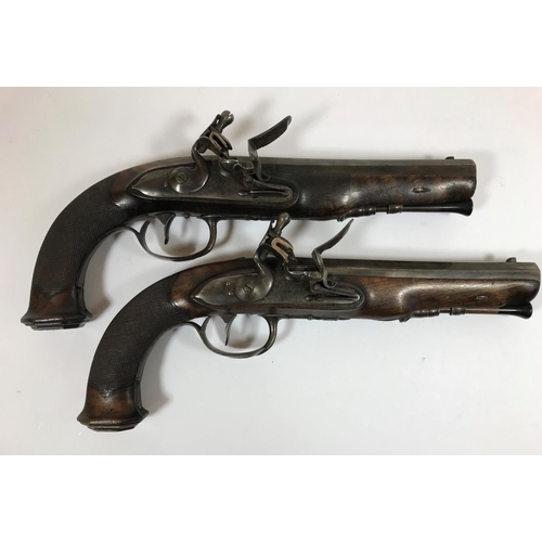 413 - A PAIR OF FRENCH FLINTLOCK PISTOLS BY DELPINE. A pair of flintlock Officers pistols with octagonal m... 