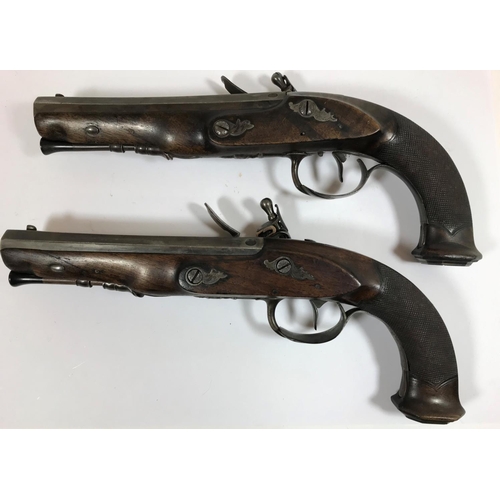 413 - A PAIR OF FRENCH FLINTLOCK PISTOLS BY DELPINE. A pair of flintlock Officers pistols with octagonal m... 