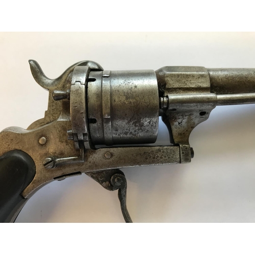 424 - A CONTINENTAL PIN FIRE REVOLVER. A continental revolver with an 8.5cm barrel, six shot revolving cha... 