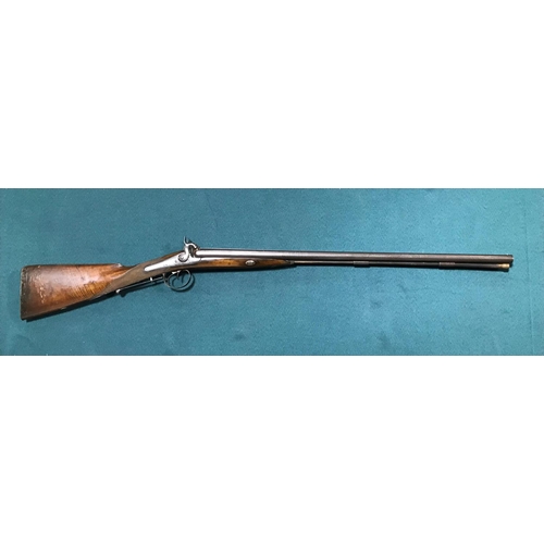 429 - A DOUBLE BARREL PERCUSSION CAP SHOTGUN. A 16 bore double barrel shotgun with 74cm damascus barrels w... 