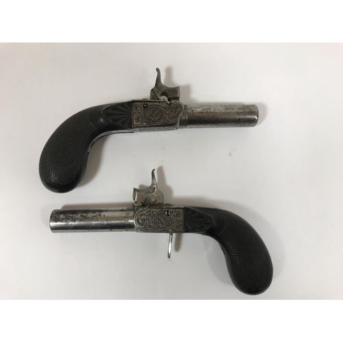 431 - TWO PAIRS OF POCKET PISTOLS. A pair of percussion cap pocket pistols with octagonal screw off barrel... 