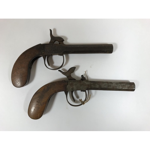 431 - TWO PAIRS OF POCKET PISTOLS. A pair of percussion cap pocket pistols with octagonal screw off barrel... 