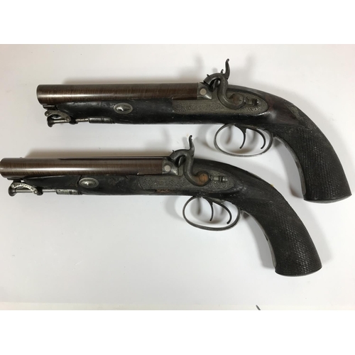 461 - A PAIR OF DOUBLE BARREL PISTOLS BY MAYBURY AND SONS. A pair of double barrel 'Howdar' type percussio... 