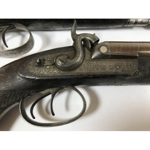 461 - A PAIR OF DOUBLE BARREL PISTOLS BY MAYBURY AND SONS. A pair of double barrel 'Howdar' type percussio... 