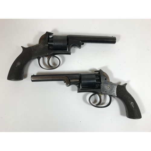 472 - A PAIR OF FIVE SHOT PERCUSSION CAP REVOLVERS. A pair of late percussion cap revolvers, blued steel, ... 