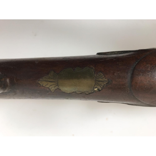 476 - A BRASS BARREL BLUNDERBUSS MARKED H. NOCK. A brass barrell flintlock blunderbuss by H. Nock, with fl... 