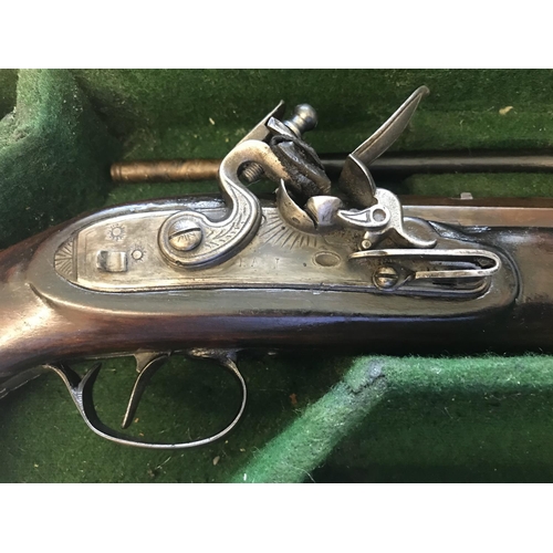 478 - A REPRODUCTION FLINTLOCK PISTOL MARKED 'J. HART'. A reproduction flintlock dueling pistol with a 24.... 