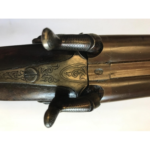 485 - A REPRODUCTION PERCUSSION CAP DOUBLE BARREL SPORTING GUN. A reproduction 12 bore side by side doubel... 