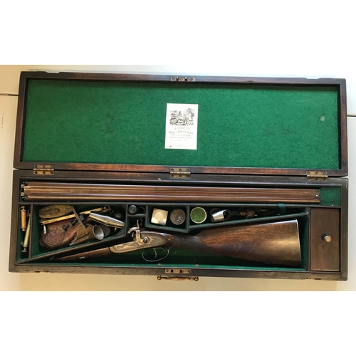 485 - A REPRODUCTION PERCUSSION CAP DOUBLE BARREL SPORTING GUN. A reproduction 12 bore side by side doubel... 