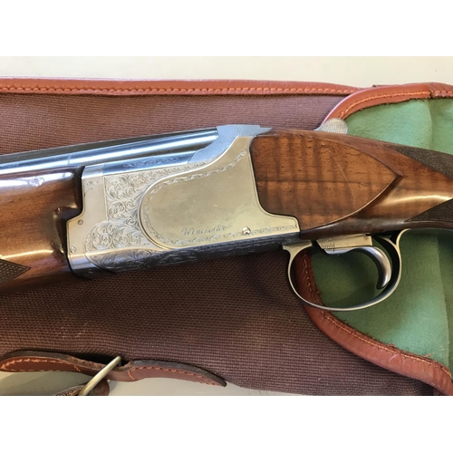 487 - A WINCHESTER OVER AND UNDER 12 BORE SHOTGUN. A Winchester 6500 Skeet 126A - 70mm 12 Bore Ejector Sho... 