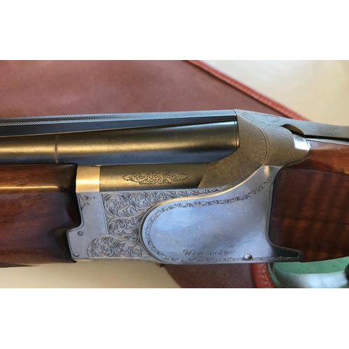 487 - A WINCHESTER OVER AND UNDER 12 BORE SHOTGUN. A Winchester 6500 Skeet 126A - 70mm 12 Bore Ejector Sho... 