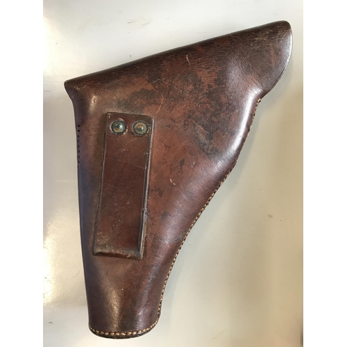 495 - A SECOND WORLD WAR PERIOD LEATHER PISTOL HOLSTER. A leather holster stamped 33 1941  CA867 (?). 25cm... 