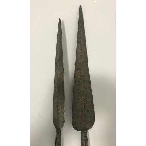 515 - TWO AFRICAN STYLE THROWING SPEARS. Two African style double ended spears with shaped points and flat... 