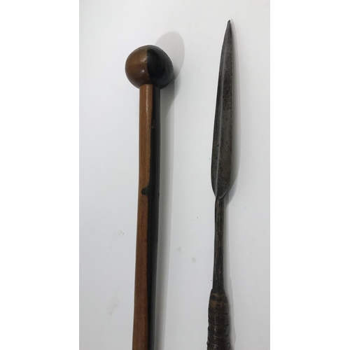 519 - A ZULU SPEAR AND A WOODEN KNOB KERRIE. The spear pointed leaf shaped tip bound to a patinated shaft,... 