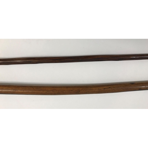 519 - A ZULU SPEAR AND A WOODEN KNOB KERRIE. The spear pointed leaf shaped tip bound to a patinated shaft,... 