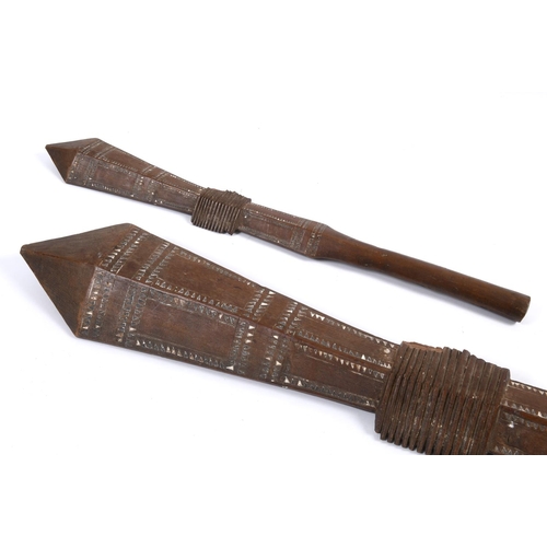 523 - A TRIBAL CLUB, PROBABLY SAMOAN. A tribal club with pointed end and of geometric shape with central b... 