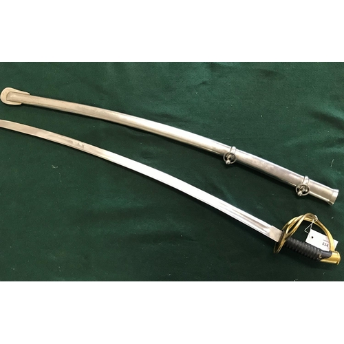 534 - A REPRODUCTION CAVALRY OFFICERS SWORD. A reproduction sword with an 87cm curved blade with double fu... 