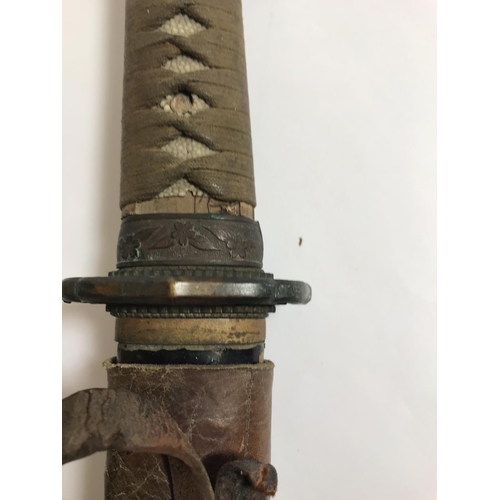 538 - A SECOND WORLD WAR JAPANESE OFFICERS SWORD. A World War Two Japanese Army Officers Shin Gunto Sword,... 