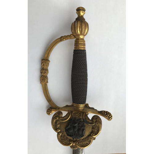 543 - CEREMONIAL SWORD - C SMITH & CO with a brass hilt and twisted wire grip, the guard with a Thistle mo... 