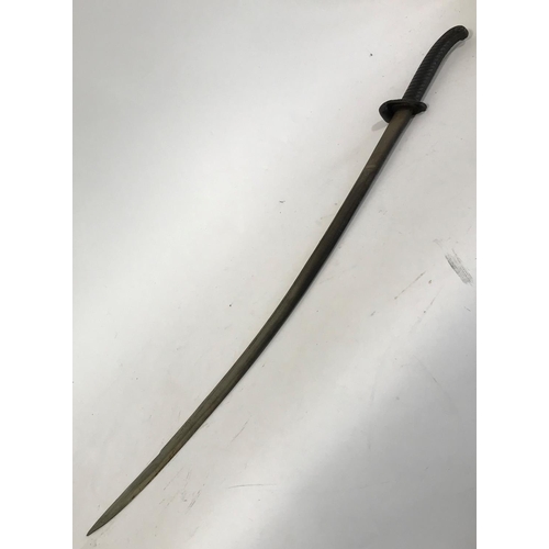 557 - AN UNUSUAL SWORD WITH CAST IRON HANDLE. A sword with a curving 77cm blade with allover scrolling and... 