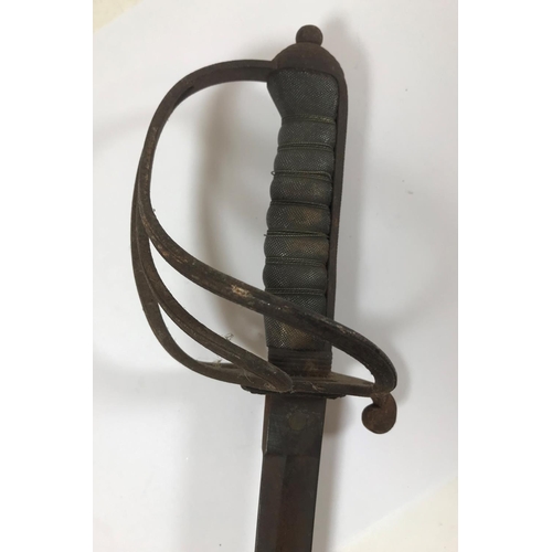 558 - A CAVALRY OFFICERS SWORD AND SCABBARD. The sword with 3 bar handle, stepped pomel and rounded nut, t... 