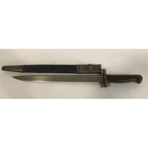 560 - AN INDIA PATTERN MARK II BAYONET. An India Pattern Baynoet, unfullered 30.5cm blade with no false ed... 