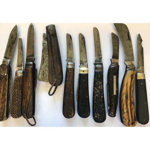 655 - A COLLECTION OF BONE HANDLED AND SIMILAR FOLDING KNIVES. A two bladed bone handled knife with an 8cm... 